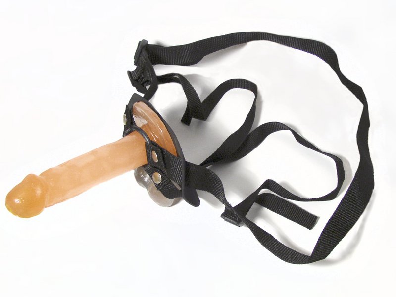 File:3-strap harness with orange dildo 01.jpg